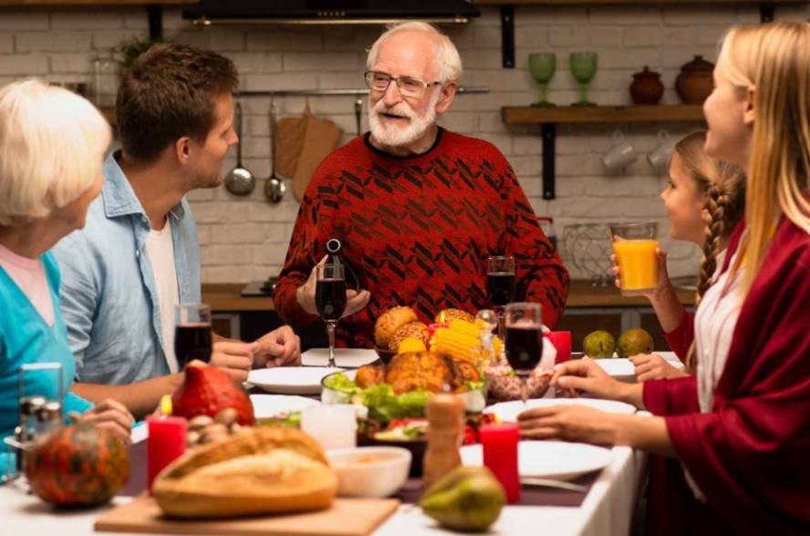 Why are football and parades part of Thanksgiving?